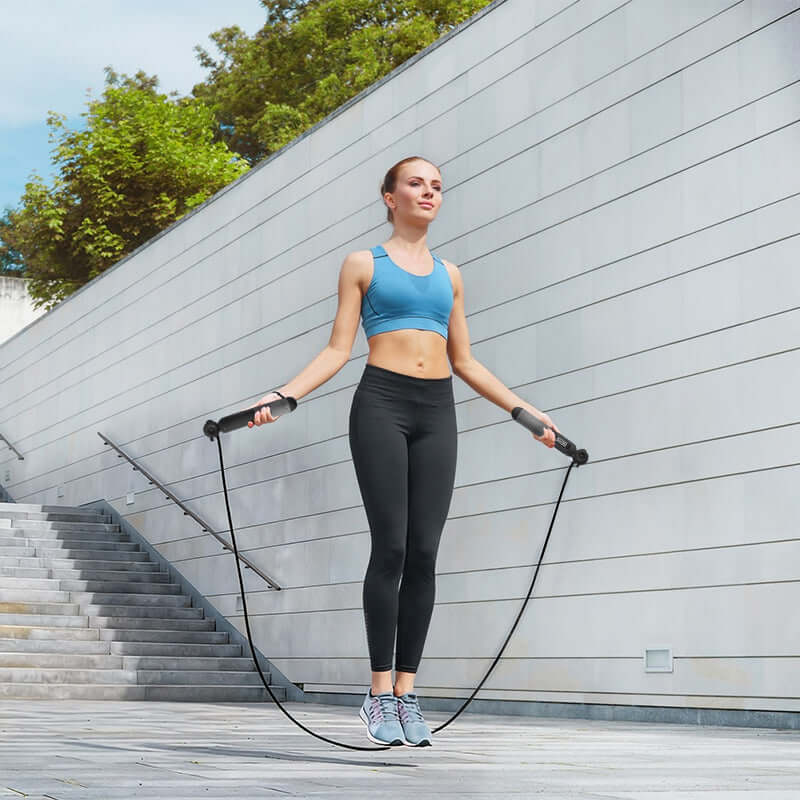 Person Skipping with an Intelligent Counting Jump Rope Outdoors